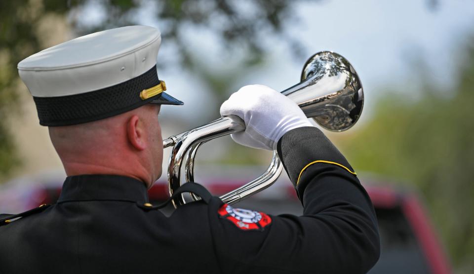 Lieutenant Johnny Rigney, Sarasota County Fire Department plays taps during the funeral of former Republican Nancy Detert a member of the Florida State Senate, representing District 28 from 2008 to 2016, and a Sarasota County Commissioner from 2016 until her death. Funeral was held at the Epiphany Cathedral located in Venice, FL. on Saturday, April 29, 2023.