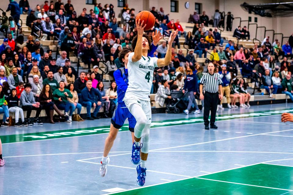 Dartmouth's Elaijah Monteiro lays it in.