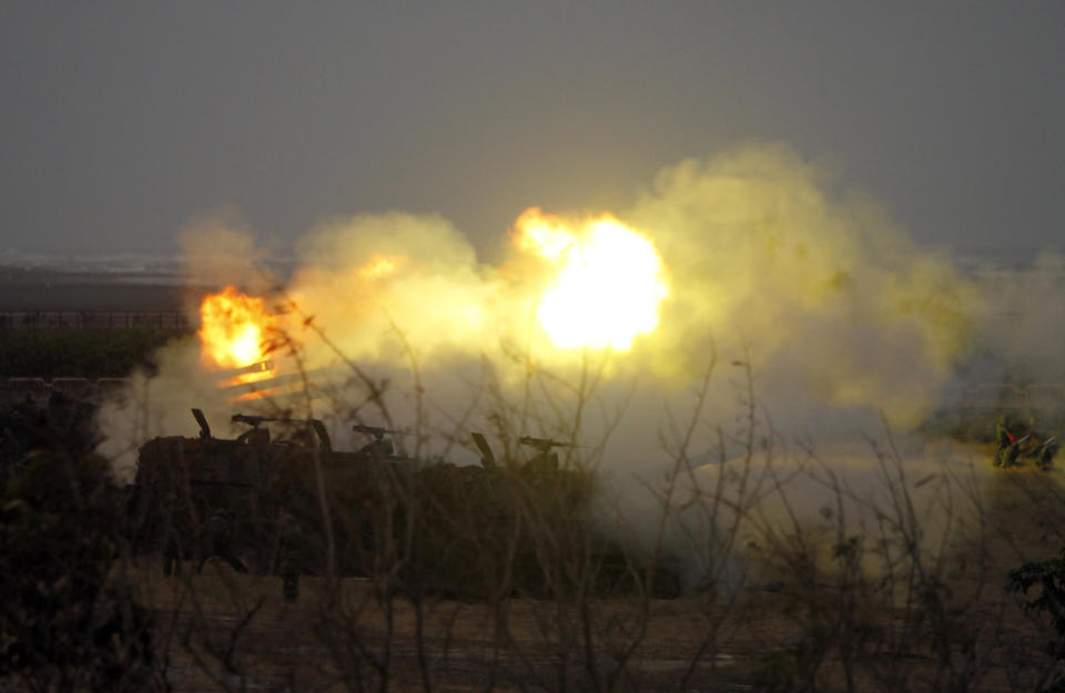 In this Thursday, Jan. 17, 2019, file photo, M110A2 self-propelled howitzers fire during a military exercises in Taichung, central Taiwan. Taiwan’s military has conducted a live-fire drill on Thursday to show its determination to defend itself from Chinese threats. (AP Photo/Chiang Ying-ying, File)