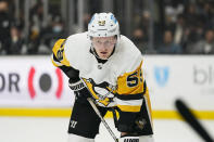 Pittsburgh Penguins' Jake Guentzel waits for the puck to drop during the first period of an NHL hockey game against the Los Angeles Kings Thursday, Jan. 13, 2022, in Los Angeles. (AP Photo/Jae C. Hong)