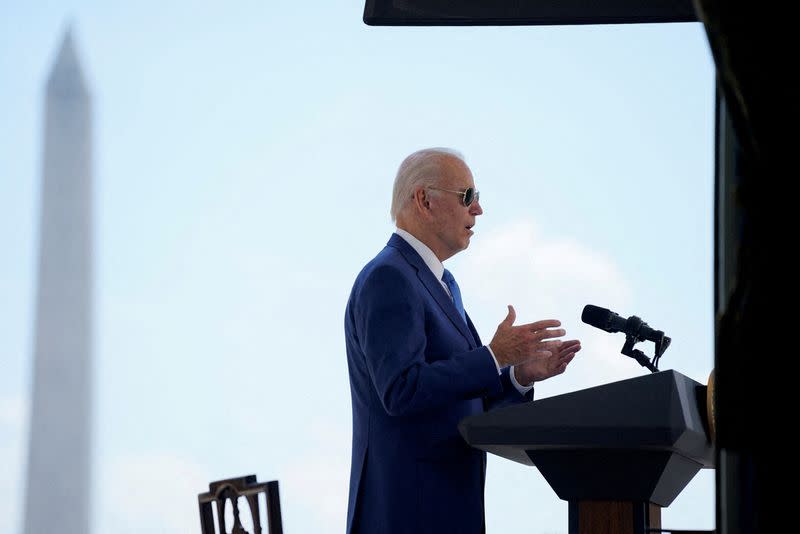 FILE PHOTO: President Joe Biden speaks before signing two bills aimed at combating fraud in the COVID-19 small business relief programs in Washington
