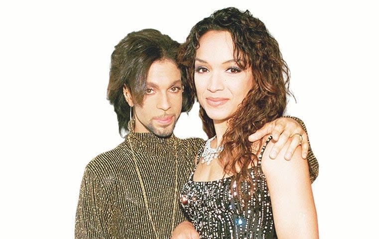 With his first wife, Mayte Garcia, in 1999 - Shutterstock