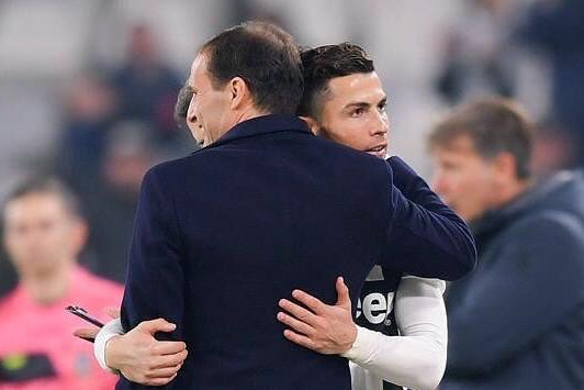 Cristiano Ronaldo embraces Massimiliano Allegri