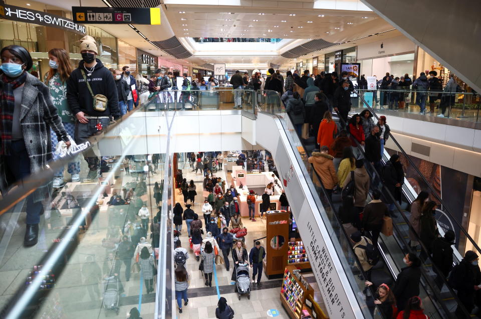 People walk through the Westfield Stratford City shopping centre, amid the coronavirus disease (COVID-19) outbreak in London, Britain, December 5, 2020. REUTERS/Henry Nicholls