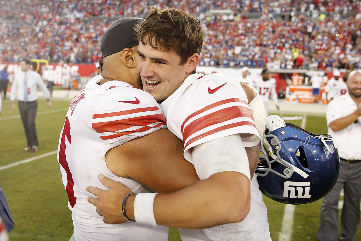 TAMPA, FLORIDA - SEPTEMBER 22:  Daniel Jones #8 of the New York Giants celebrates with Jon Halapio #75 after defeating the Tampa Bay Buccaneers 32-31 at Raymond James Stadium on September 22, 2019 in Tampa, Florida. (Photo by Michael Reaves/Getty Images)