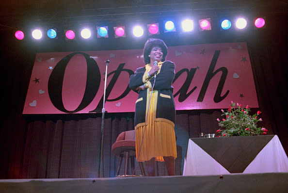 (Original Caption) Denver: Popular talk show host Oprah Winfrey entertains the crowd at a benefit in Denver with anecdotes about some of the guests on her daytime show. Winfrey’s appearance in Denver benefitted Passages, Inc., a group established to help women enter the workforce.