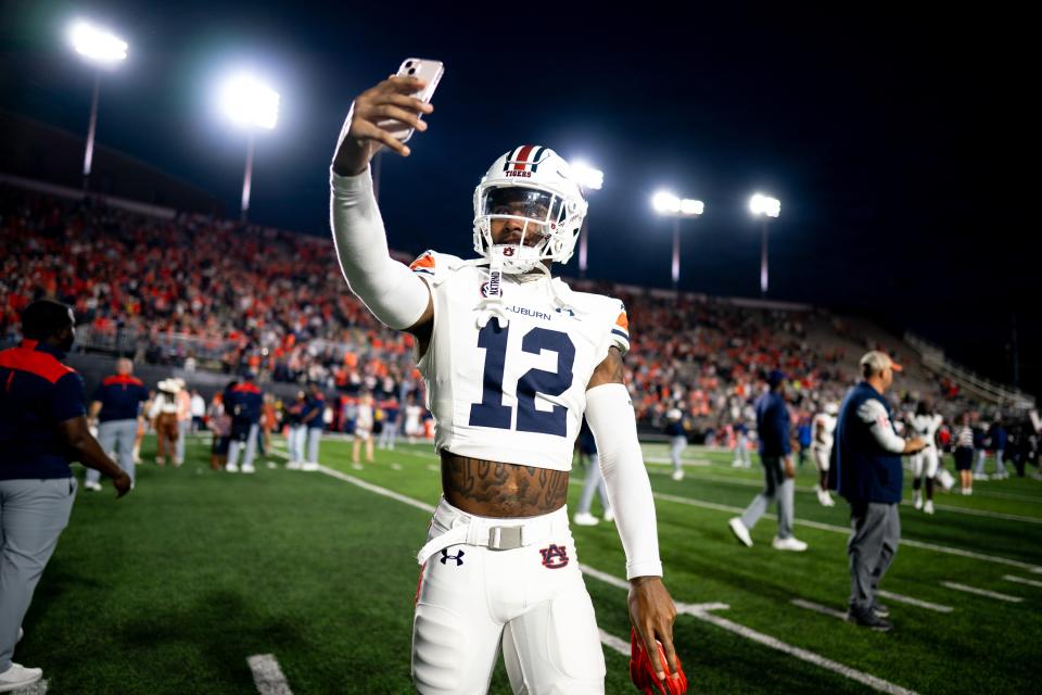 Auburn safety Caleb Wooden (12) exits the field after defeating Vanderbilt at FirstBank Stadium in Nashville, Tenn., Saturday, Nov. 4, 2023.