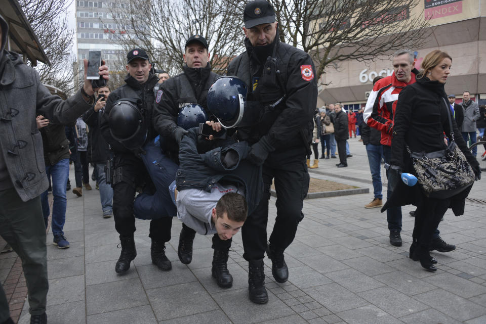 Bosnian Serb arrest activist of group "Justice for David" during police raid in the Bosnian town of Banja Luka, 240 kms northwest of Sarajevo, Bosnia, on Tuesday, Dec.25, 2018. Bosnian Serb police have detained Davor Dragicevic, the man whose quest for the truth over the death of his son has sparked months of anti-government protests. (AP Photo/Radivoje Pavicic)