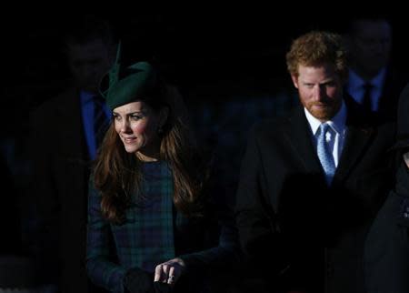 Britain's Catherine, the Duchess of Cambridge, and Prince Harry leave a Christmas Day morning service at the church on the Sandringham Estate in Norfolk, eastern England, December 25, 2013. REUTERS/Andrew Winning