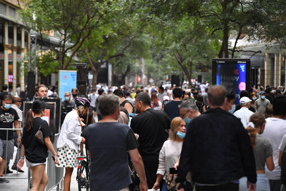 Crowd of shoppers are seen in Pitt St Mall in Sydney. About 80% of all cancers treated in Australia are skin cancers.Source: AAP