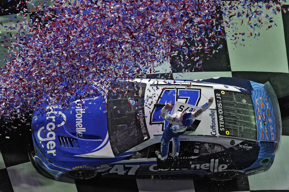 Ricky Stenhouse Jr. celebrates after winning the NASCAR Daytona 500 auto race Sunday, Feb. 19, 2023, at Daytona International Speedway in Daytona Beach, Fla. (AP Photo/Chris O'Meara)