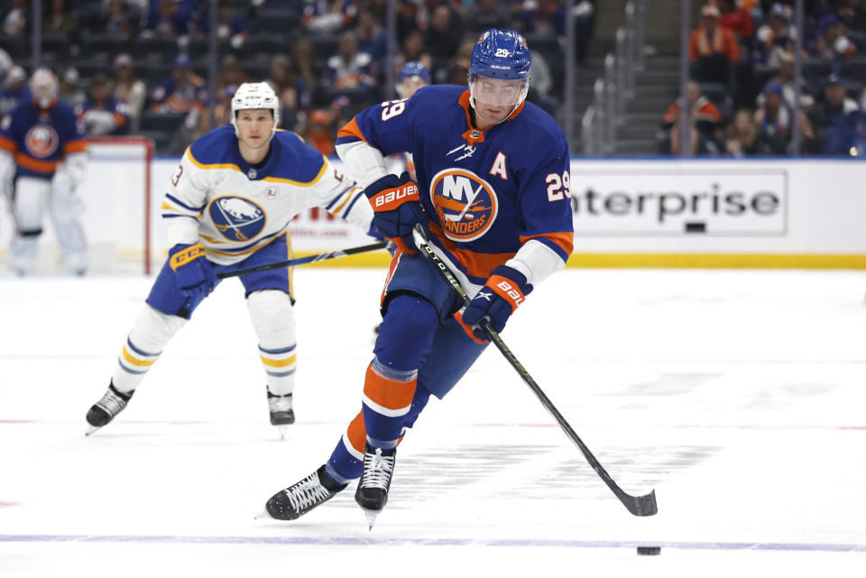 New York Islanders center Brock Nelson (29) skates with the puck against the Buffalo Sabres during the second period of an NHL hockey game, Saturday, Oct. 14, 2023, in New York. (AP Photo/Noah K. Murray)
