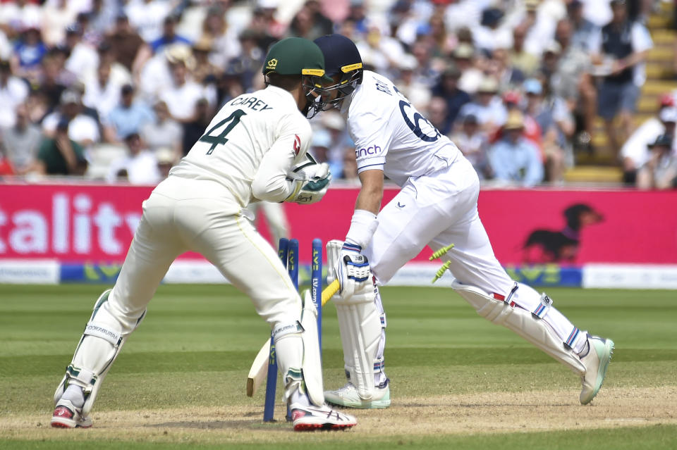 England's Joe Root, right, is stumped by Australia's Alex Carey, left, during day four of the first Ashes Test cricket match, at Edgbaston, Birmingham, England, Monday, June 19 2023. (AP Photo/Rui Vieira)