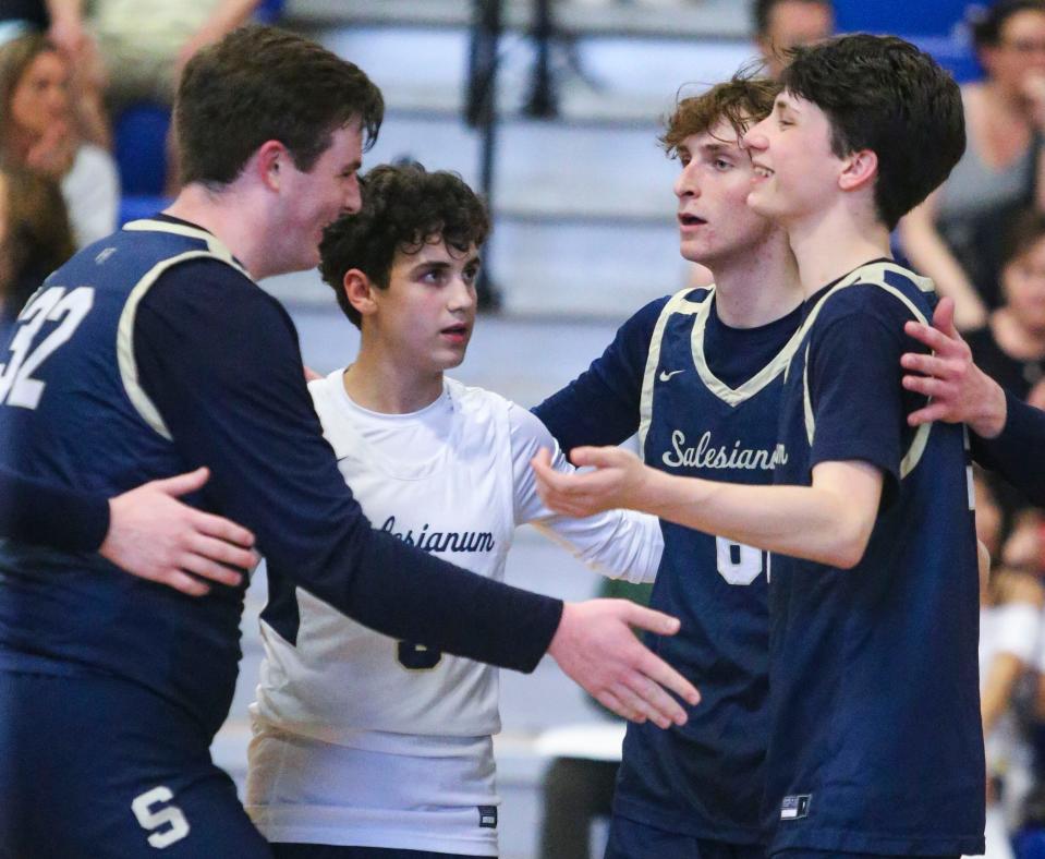 Salesianum's (from left) Ronan Landis, Aiden Dietrich, Cody Popp and Colin McLaughlin come together between points in a 3-0 win at Charter of Wilmington on May 1. The tops-seeded Sals will host William Penn in the first round of the DIAA Boys Volleyball Tournament at 6 p.m. Tuesday.