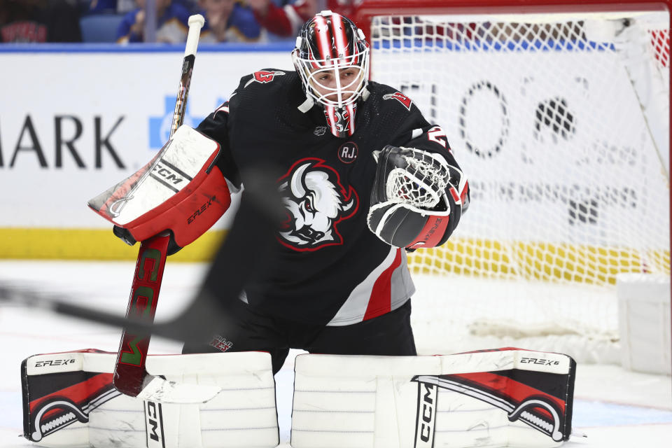 Buffalo Sabres goaltender Devon Levi makes a glove save against the Montreal Canadiens during the second period of an NHL hockey game Saturday, Dec. 9, 2023, in Buffalo, N.Y. (AP Photo/Jeffrey T. Barnes)