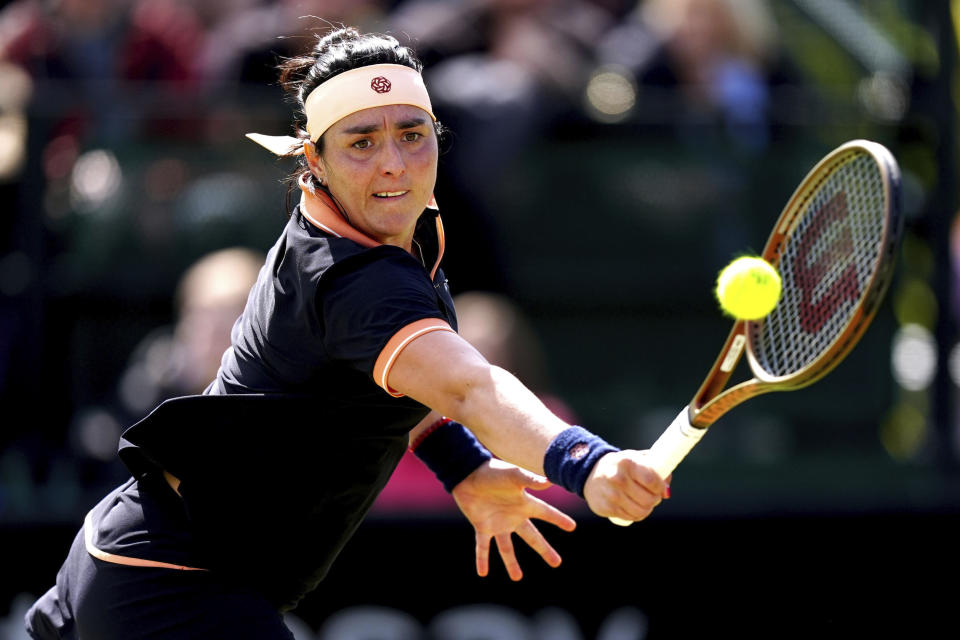 Tunisia's Ons Jabeur in action during her women's singles quarterfinal match against Czech Republic's Karolina Pliskova on day six of the Rothesay Open at the Nottingham Tennis Centre, Nottingham, England, Saturday June 15, 2024. (Mike Egerton/PA via AP)