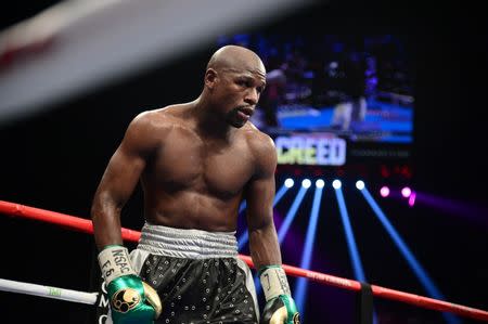 Floyd Mayweather (black trunks) and Andre Berto (white trunks) box during their WBA/WBC welterweight title bout at MGM Grand Garden Arena. Joe Camporeale-USA TODAY Sports