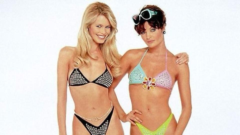 Helena Christensen and Claudia Schiffer pose for Chanel's summer spring 1995 campaign in bikinis