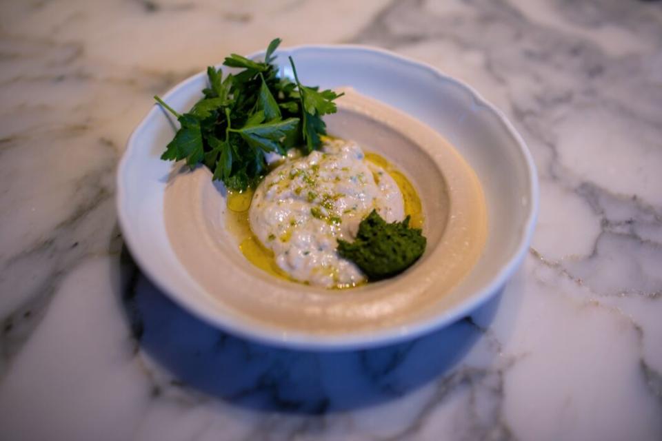 A bowl of hummus masabacha.