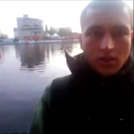 A still image taken from a short 'selfie' video clip from a social media website purportedly shows Anis Amri, the Tunisian suspect of the Berlin Christmas market attack, at an unknown location. Social Media/via Reuters TV/ Files