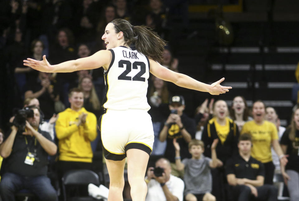 Iowa guard Caitlin Clark gestures to the crowd after a basket during the second half against Drake on Nov. 19 at Carver-Hawkeye Arena in Iowa City. (Photo by Matthew Holst/Getty Images)