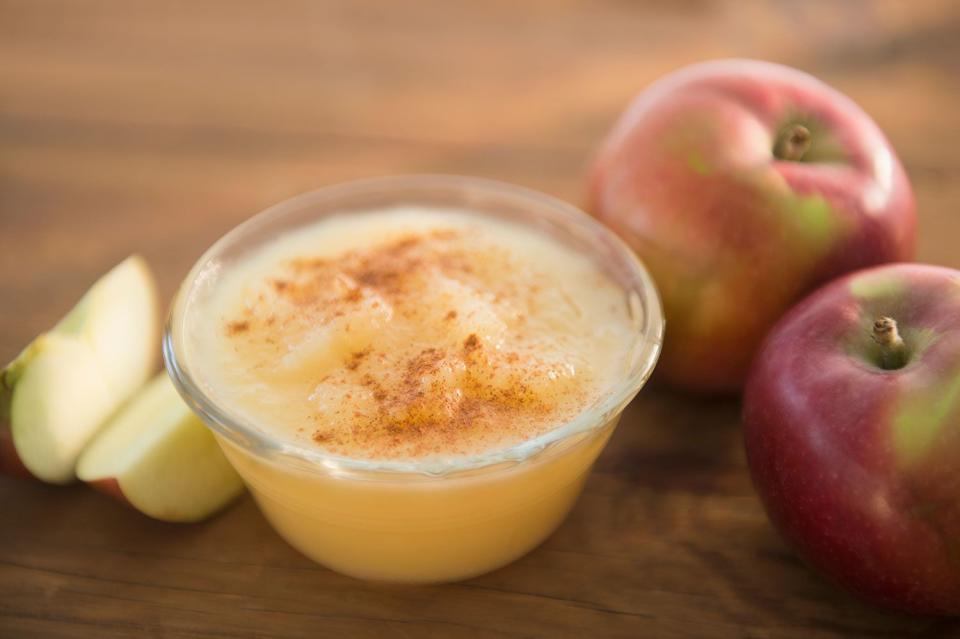 <p>getty</p> Stock image of Applesauce and apples