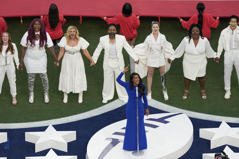 Country music artist Mickey Guyton performs the national anthem before the NFL Super Bowl 56 football game between the Los Angeles Rams and the Cincinnati Bengals, Sunday, Feb. 13, 2022, in Inglewood, Calif. (AP Photo/Matt Rourke)