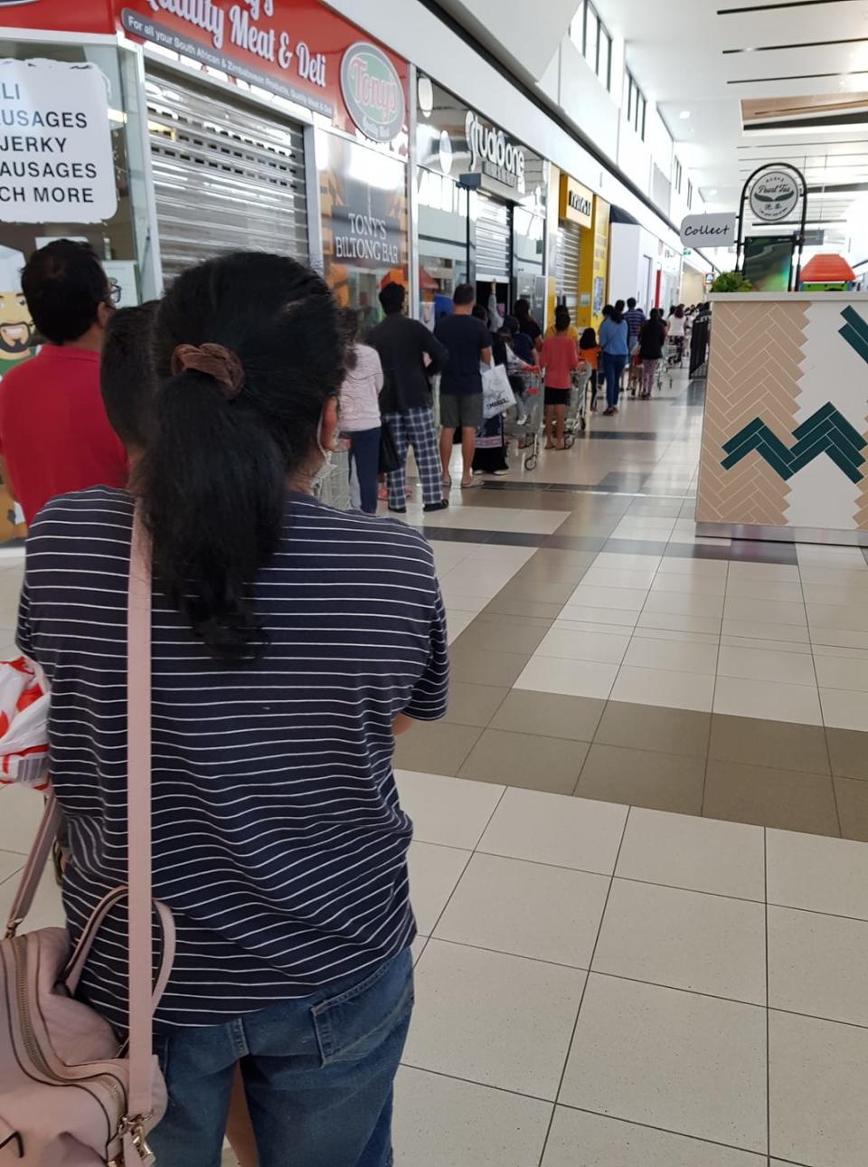 Shoppers waited in lengthy queues to get their hands on the bargain Special Buys. Photo: Facebook.