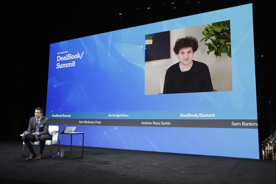 NEW YORK, NEW YORK - NOVEMBER 30: Andrew Ross Sorkin and Sam Bankman-Fried on stage at the 2022 New York Times DealBook on November 30, 2022 in New York City. (Photo by Thos Robinson/Getty Images for The New York Times)