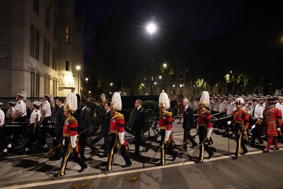 A funeral procession marches through Parliament Square during a rehearsal (PA)