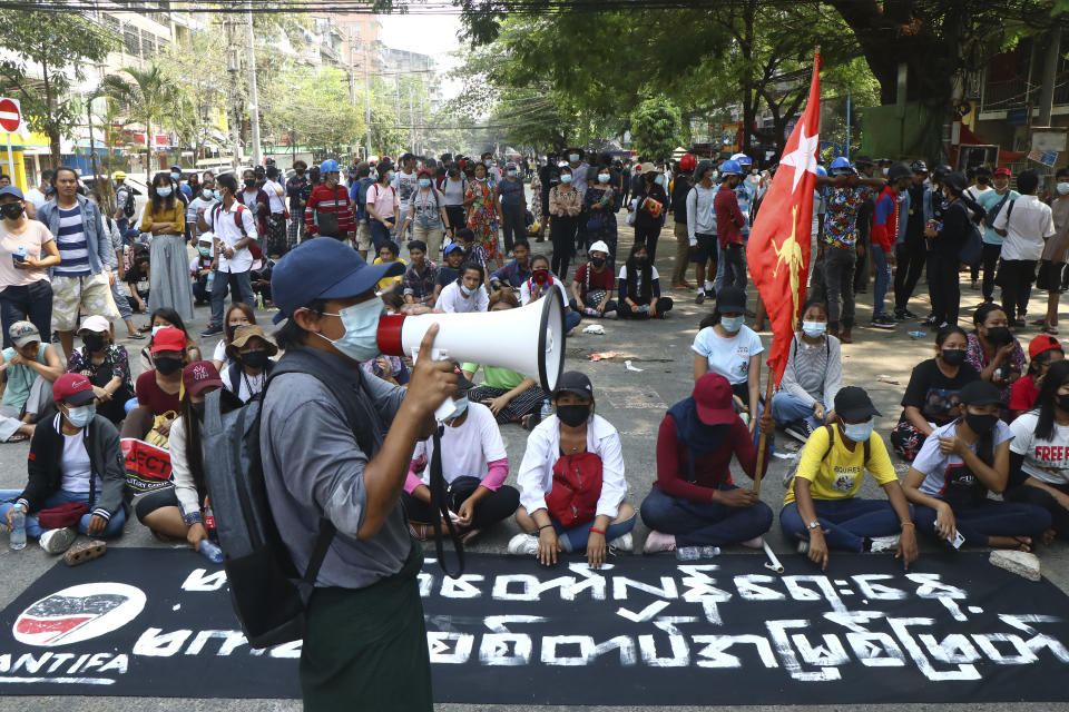 Protesters occupy a street during a rally against the military coup Saturday, March 27, 2021, in Tarmwe township in Yangon, Myanmar. The head of Myanmar’s junta on Saturday used the occasion of the country’s Armed Forces Day to try to justify the overthrow of the elected government of Aung San Suu Kyi, as protesters marked the holiday by calling for even bigger demonstrations. (AP Photo)