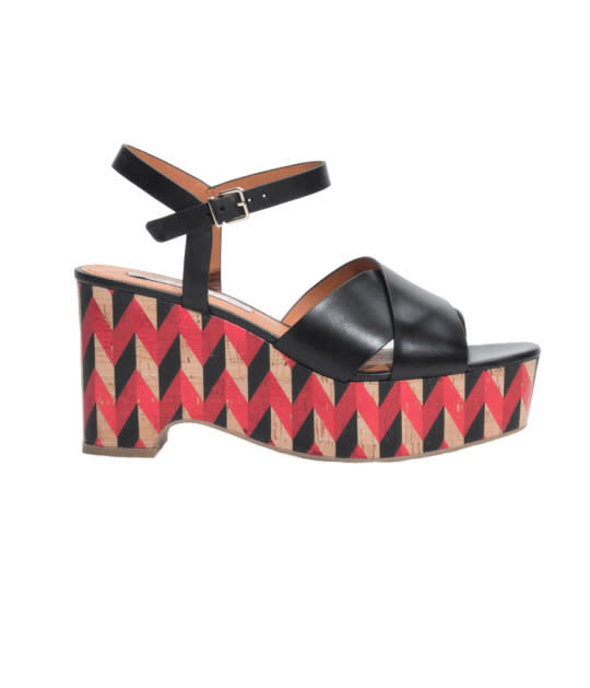 <p>Chevron Cork Platform Sandals, $135, S<a href="http://www.stories.com/us/Shoes/Sandals/Chevron_Cork_Platform_Sandals/102336907-102904555.1" rel="nofollow noopener" target="_blank" data-ylk="slk:tories.com;elm:context_link;itc:0;sec:content-canvas" class="link ">tories.com</a></p>