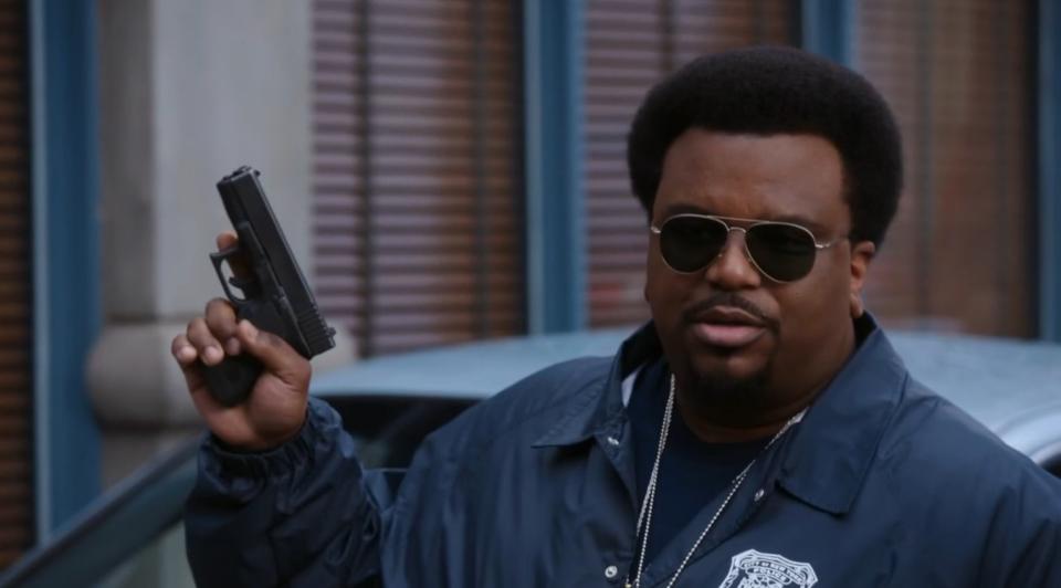 Doug Judy wearing shades and holding a gun in "Brooklyn Nine-Nine"