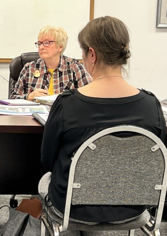 Planning board chair Sue Hodgin listens as other committee members ask questions during a planning board review committee meeting, held December 14 at the Southport Fire Substation on E. Nash Street.