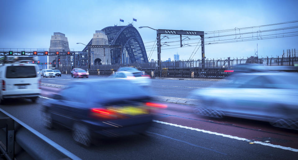 Sydney, Australia City Traffic, Driving Cars and Big Iron Bridge Source: Getty Images 