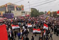 Supporters of Iraqi Shi'ite cleric Moqtada al-Sadr protest against what they say is U.S. presence and violations in Iraq, during a demonstration in Baghdad