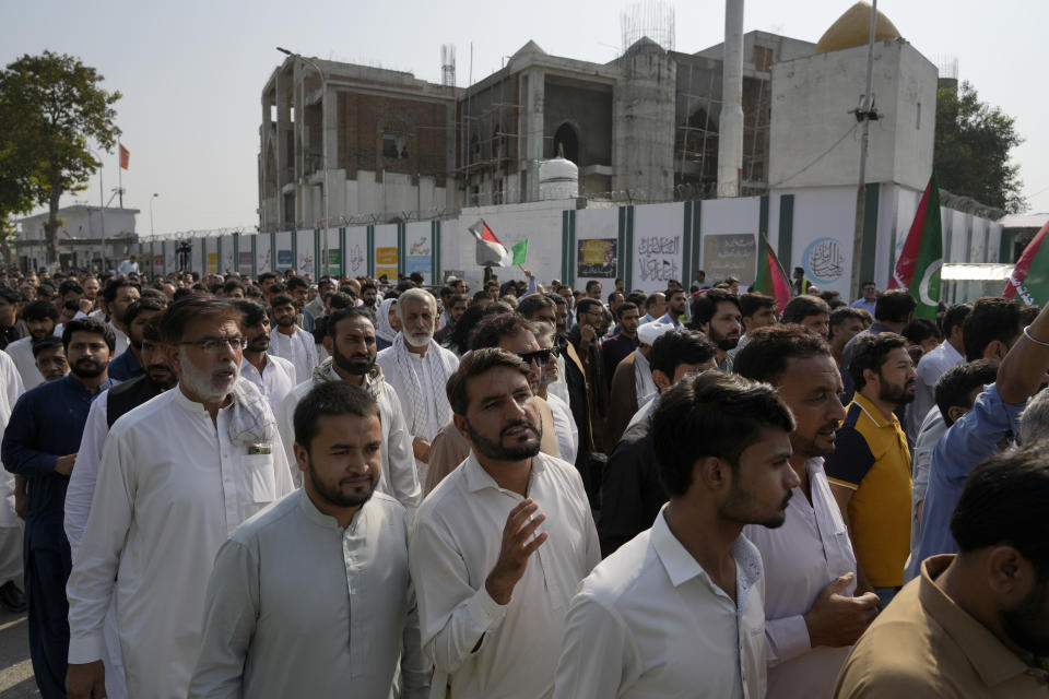 Shiite Muslims take part in a demonstration against Israeli airstrikes on Gaza to show solidarity with Palestinian people, in Islamabad, Pakistan, Friday, Oct. 13, 2023. (AP Photo/Anjum Naveed)