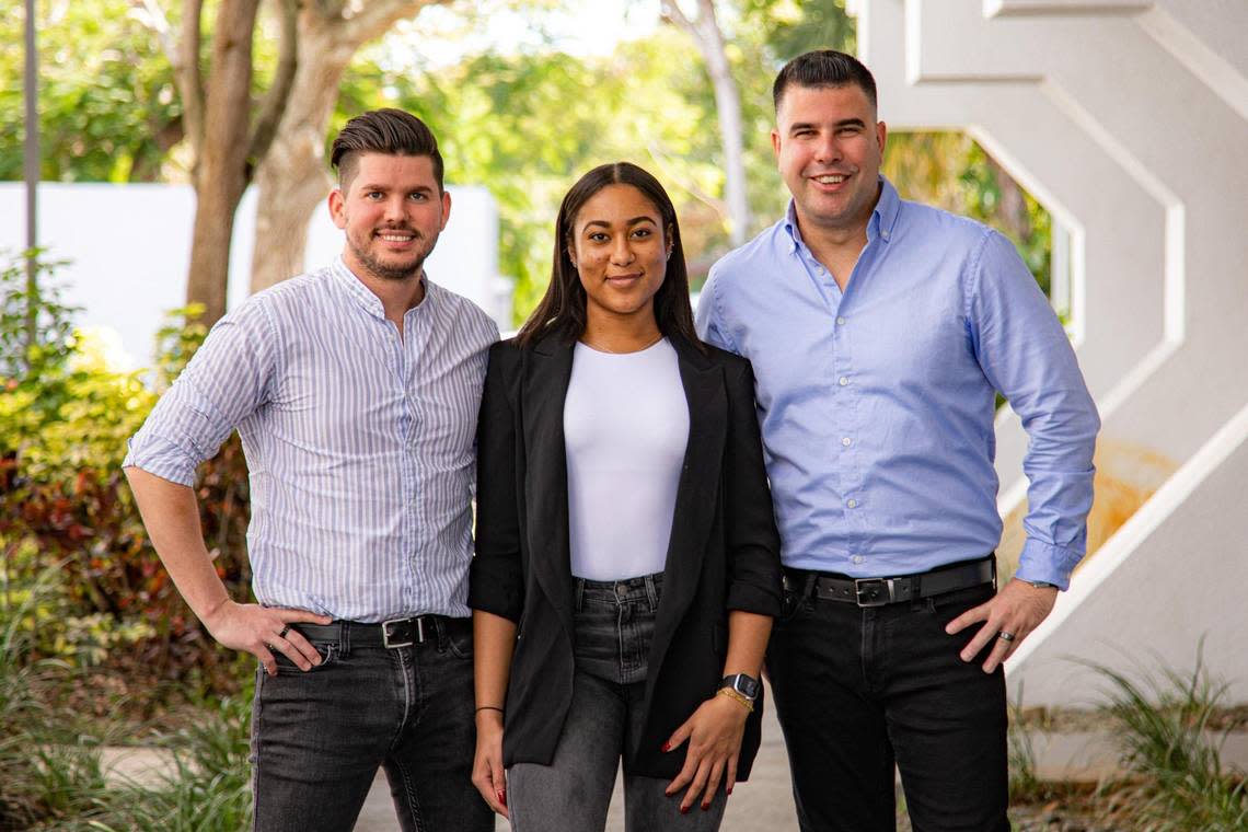 Entrepreneurs Jaime Manteiga, left, Ana Suárez and Janse Lazo stand outside their offices in Kendall, where their startup TapTok operates.