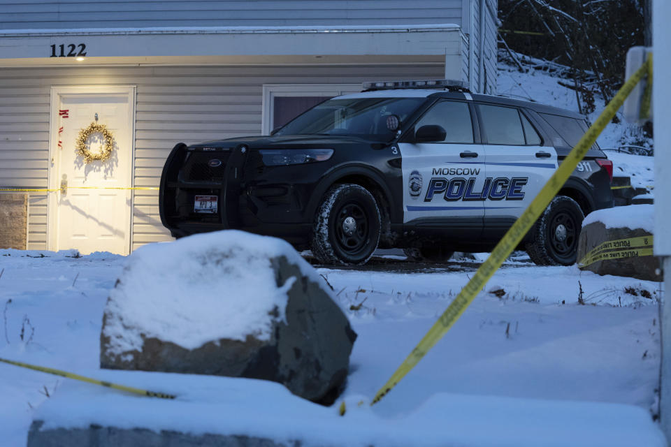 FILE - A Moscow police officer stands guard in his vehicle, Tuesday, Nov. 29, 2022, at the home where four University of Idaho students were found dead on Nov. 13, in Moscow, Idaho. A suspect in the killings of four University of Idaho students was arrested in eastern Pennsylvania, a law enforcement official said Friday, Dec. 30. (AP Photo/Ted S. Warren,File)
