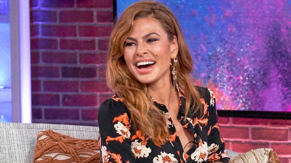 Eva Mendes laughing while on the Kelly Clarkson Show