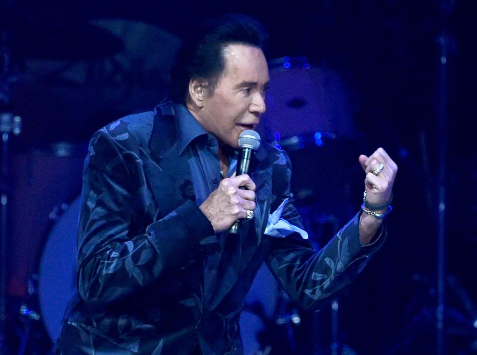 Wayne Newton, 81, shown here performing in 2017, is the sole remaining performer whose career started in the heyday of the Las Vegas Strip. His show, which will continue into 2024, pays tribute to legends of the past, from Frank Sinatra to Glen Campbell.