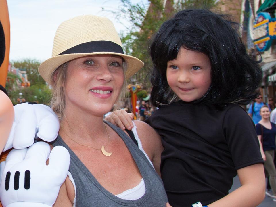 Christina Applegate and daughter Sadie LeNoble celebrate "Halloween Time" with Minnie Mouse at Disneyland on October 12, 2015 in Anaheim, California