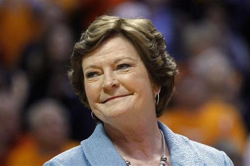 FILE - In this Jan. 28, 2013, file photo, former Tennessee women's basketball coach Pat Summitt smiles as a banner is raised in her honor before the team's NCAA college basketball game against Notre Dame in Knoxville, Tenn. Amid reports of Summitt’s failing health as her Alzheimer’s disease progresses, her family issued a statement Sunday, June 26, 2016, asking for prayers and saying that the former Tennessee women’s basketball coach is surrounded by the people who mean the most to her. (AP Photo/Wade Payne, File)