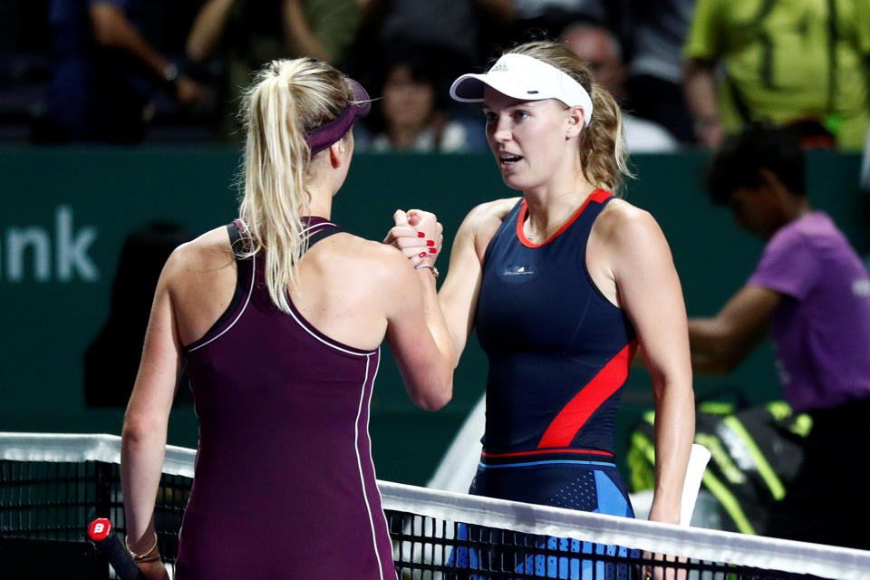 Caroline Wozniacki congratulates Elina Svitolina after losing to the Ukrainian at the WTA Finals Singapore. (PHOTO: Reuters/Edgar Su)