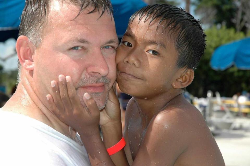 Jerry Windle and his son Jordan, age 6, at a water park just before he started diving, his father said.