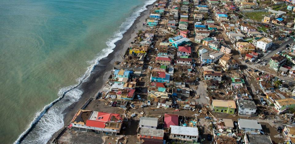 An aerial view of Roseau, the capital of Dominica, shows the destruction on Thursday, three days after passage of Hurricane Maria. (Photo: LIONEL CHAMOISEAU via Getty Images)