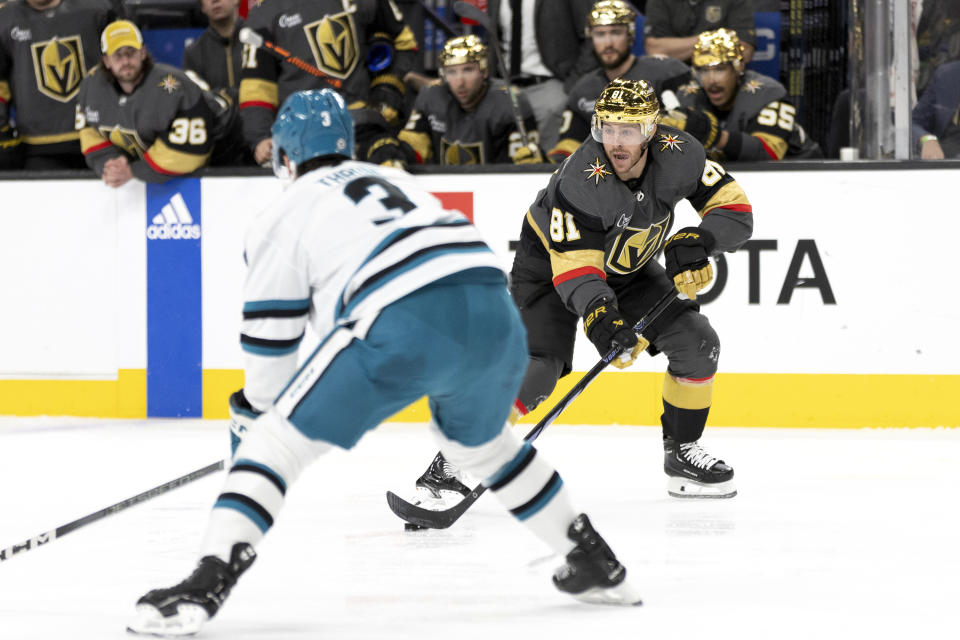 Vegas Golden Knights right wing Jonathan Marchessault (81) skates upice against San Jose Sharks defenseman Henry Thrun (3) before scoring a goal during the second period of an NHL hockey game Sunday, Dec. 10, 2023, in Las Vegas. (AP Photo/Ellen Schmidt)