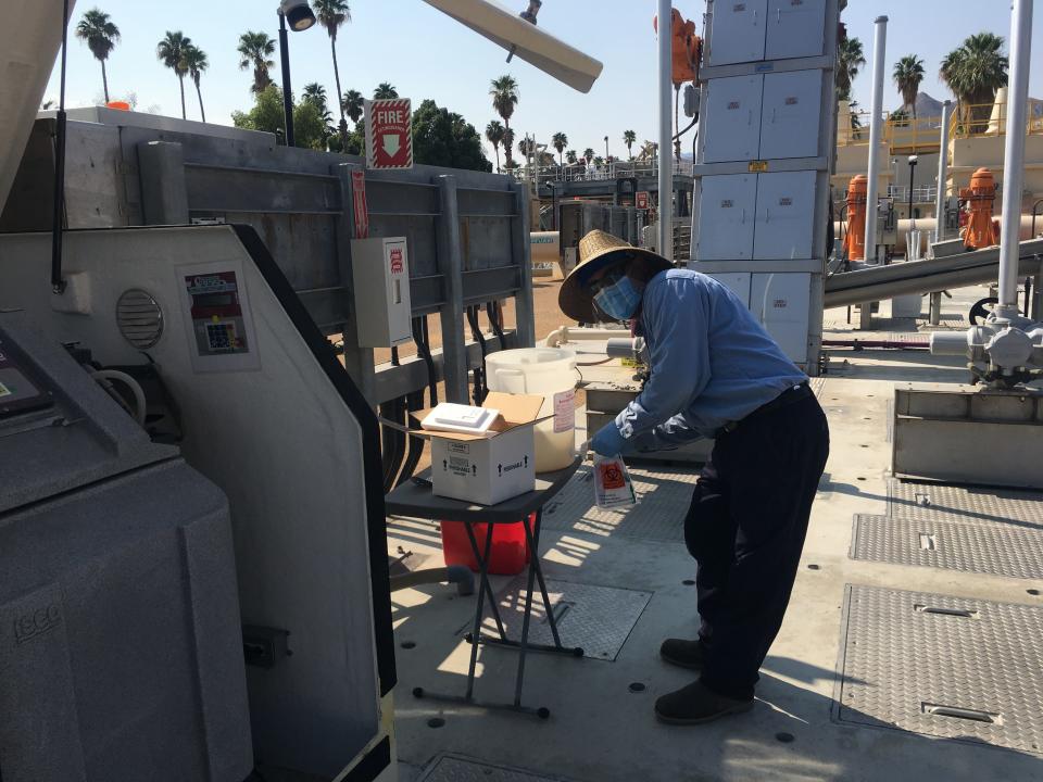 Ramon Lopez, lead operator and lab supervisor for the City of Palm Springs, California, collects samples at the city’s wastewater treatment plant and sends it on dry ice for COVID-19 testing at GT Molecular in Fort Collins, Colorado.