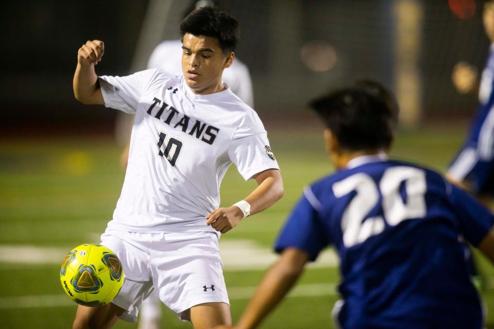 Golden Gate's Jerry Carrera (10) controls the ball during the boys soccer game between Golden Gate and Naples on Wednesday, Jan. 26, 2022 at Naples High School in Naples, Fla. 