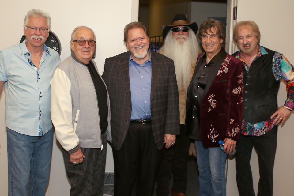 The Oak Ridge Boys with ‘Elvira’ songwriter Dallas Frazier. Pictured L-R: The Oak Ridge Boys’ Joe Bonsall, manager Jim Halsey, Dallas Frazier, William Lee Golden, Richard Sterban, Duane Allen - Credit: Jeremy Westby